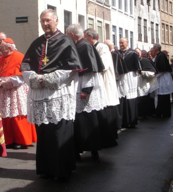 clerics in choir robes or choir dress